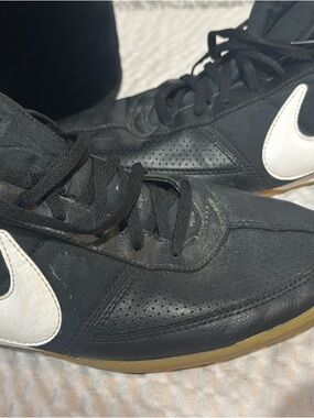 Nike Black Low-Top Sneakers with White Swoosh